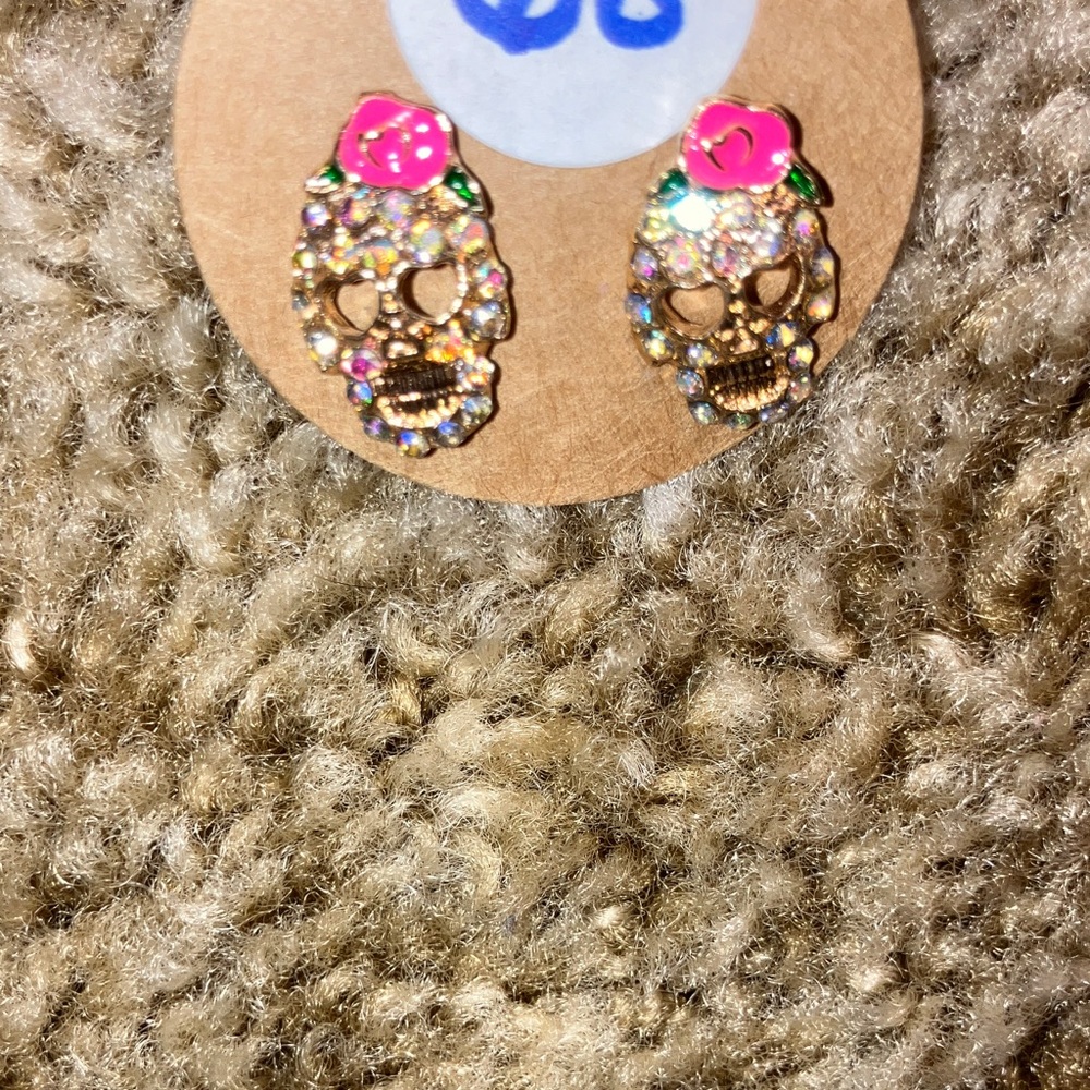 Sparkling Skull Earrings with Pink Accents